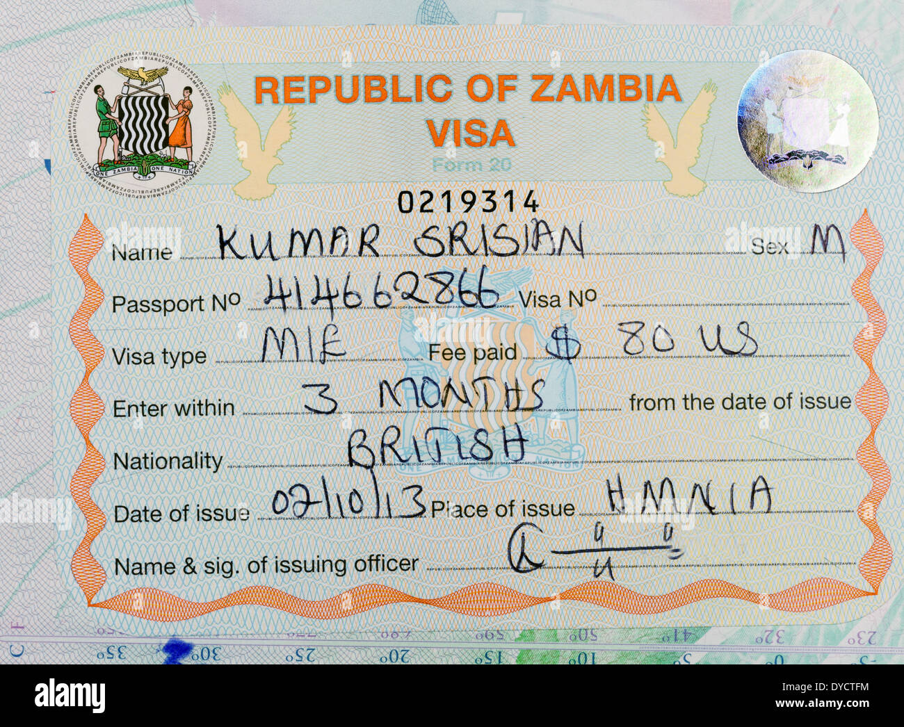 Zambia travel - a zambian visa stamp in a British passport fro holiday travel Stock Photo
