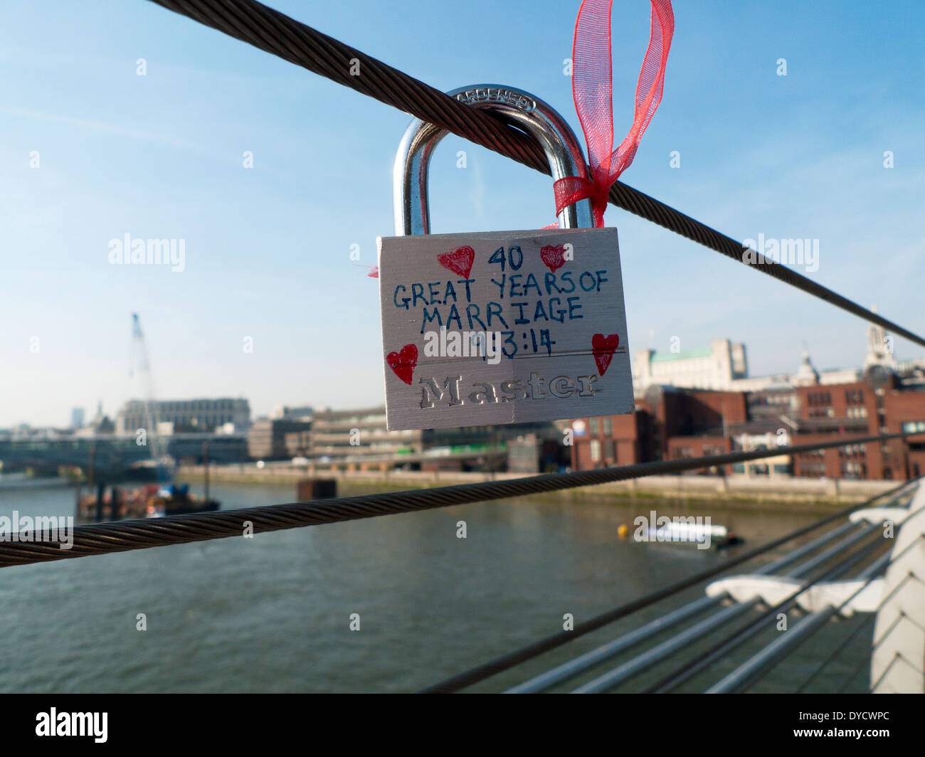 Lovers padlock celebrating 40 years of marriage on Millennium Bridge