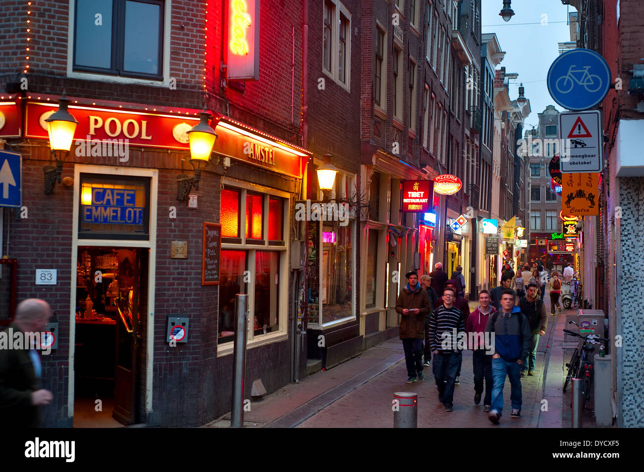 People at Old Town street in Amsterdam. Amsterdam is the capital city of and the most populous within the Kingdom of the Netherl Stock Photo