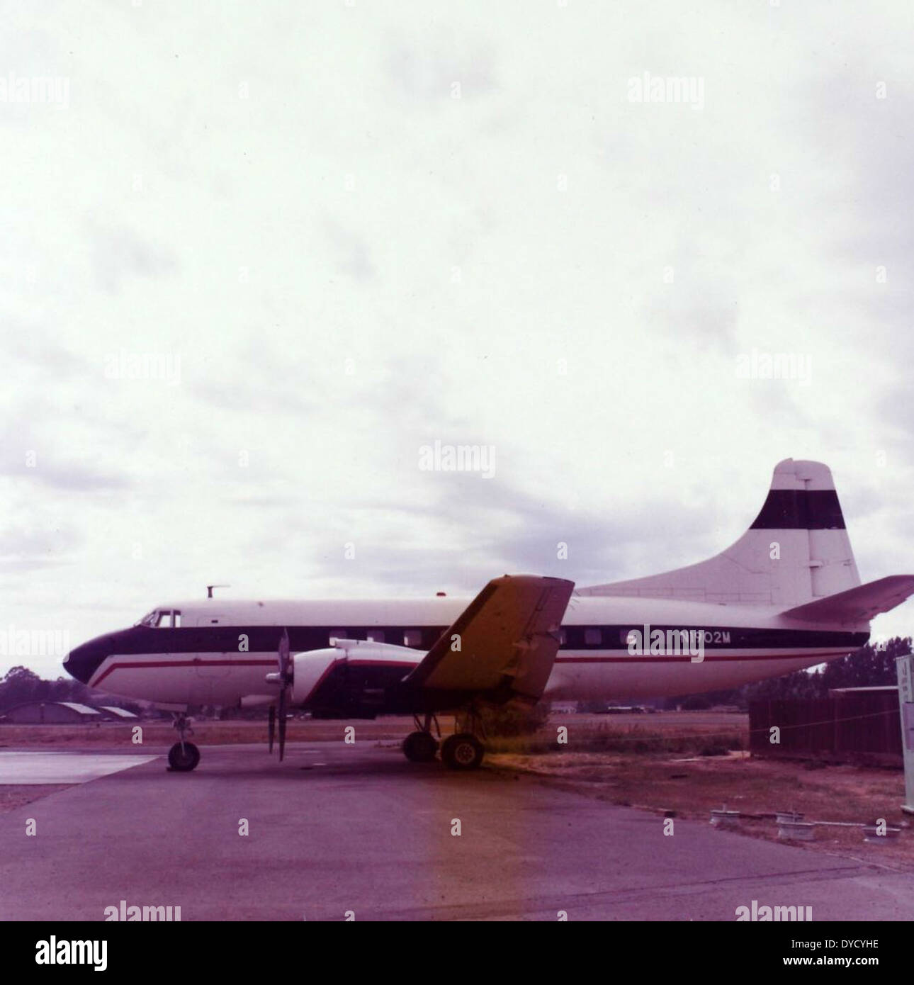 This image from the AL-48 Bradley Album shows the Martin 4-0-4 aircraft with registration number N1902M at an airshow. The Martin 4-0-4, a twin-engine airliner, was used primarily in the 1950s for commercial and regional flights. The aircraft's sleek design and distinctive nose are visible in the photograph, emphasizing its historical significance during the era of early post-World War II aviation. Stock Photo