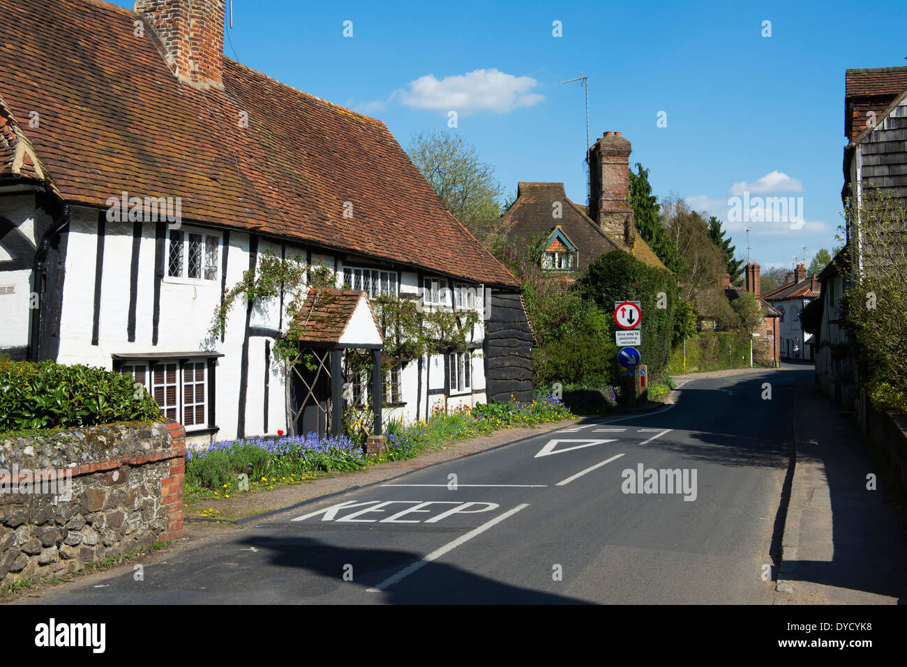 Timber framed cottages adjacent to the road in the village of Shere on the North Downs in Surrey Stock Photo