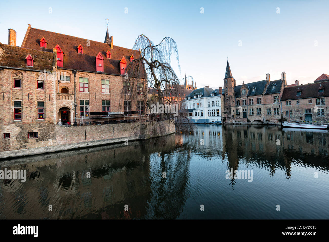 BRUGES, Belgium - Sometimes called 'The Venice of the North,' the historic Flemish city of Bruges has canals running through the old town. Before the water access became silted up, Bruges was a major commercial port. The building in the foreground at left is known as Perez de Malvenda, the 15th century mayor's house. Stock Photo
