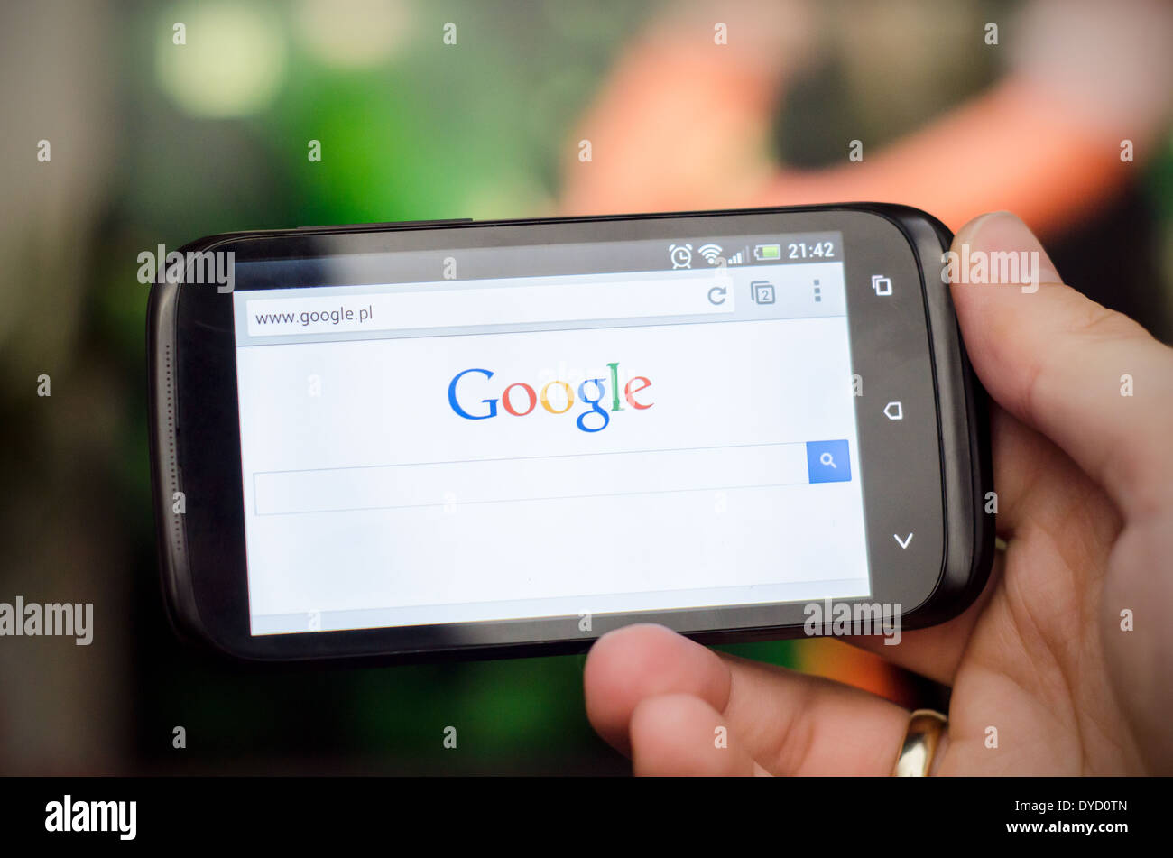Smartphone with Google search website Stock Photo