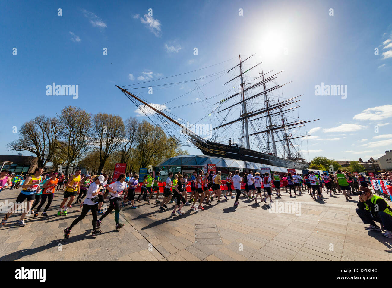 London UK. 13 April 2014 London Virgin Money Marathon runners circling the Cutty Sark clipper ship in Greenwich during race Credit:  John Henshall/Alamy Live News JMH6150 Stock Photo