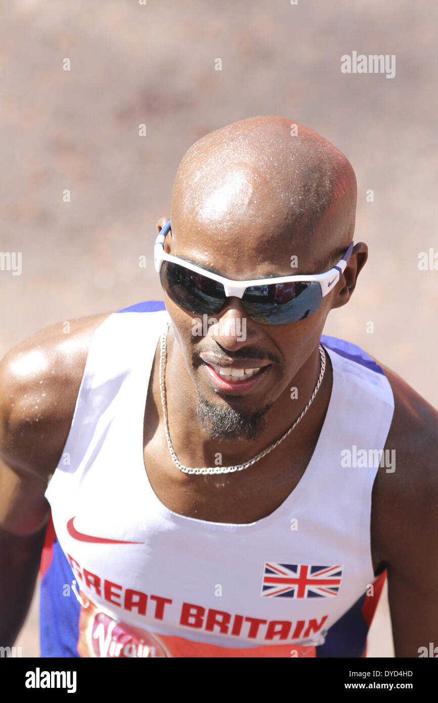 London, UK . 13th Apr, 2014. Mo Farah (GBR) at the finish of the 2014 Men's Virgin London Marathon. Farah finished in eighth place with a time of  2hrs 8mins 21secs. When interviewed Farah said it had been conceded it had been a “bad day at the office.' Credit:  Michael Preston/Alamy Live News Stock Photo