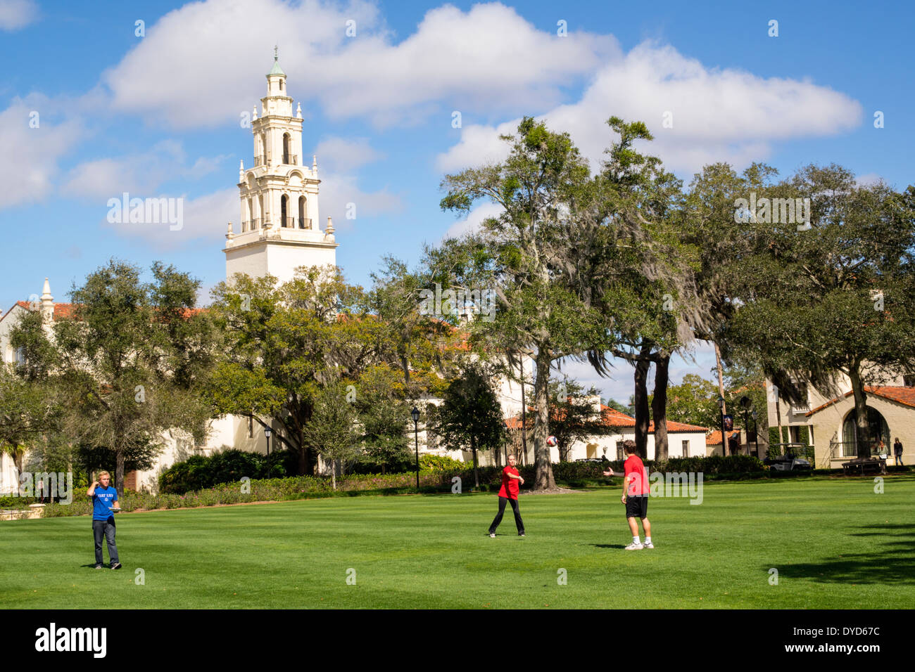 Winter Park Florida,Rollins College,campus,school,Knowles Memorial Chapel,lawn,student students throwing,ball,teen teens teenager teenagers boy boys,m Stock Photo