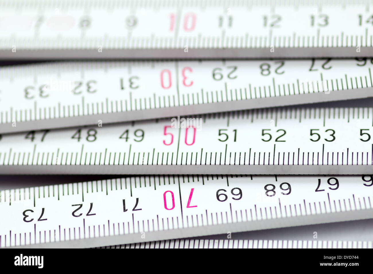 folding meter rule - measure twice, cut once Stock Photo