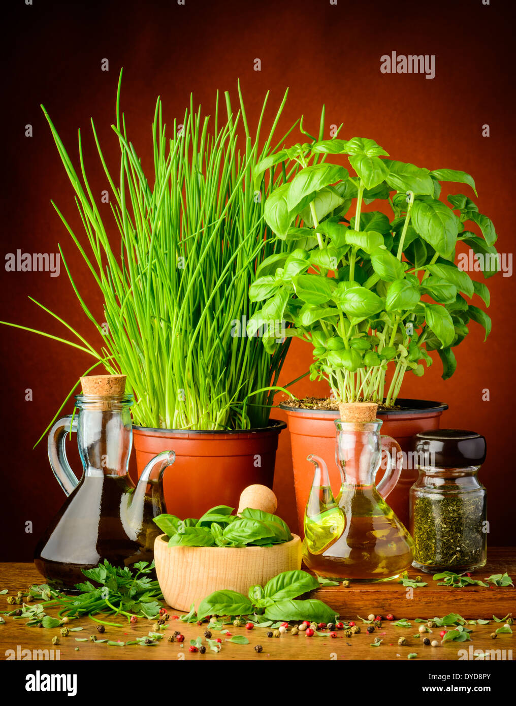 mediterranean seasoning with spices, herbs, olive and herbal oil Stock Photo