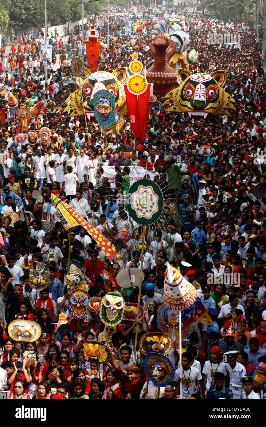 DHAKA, BANGLADESH - APRIL 14: Bangladeshi revelers march during a rally in celebration of the Bengali New Year, or “Pohela Boishakh”, in Dhaka. Pahela Baishakh, the first day of the Bangla month, can be traced back to its origins during the Mughal period when Emperor Akbar introduced the Bangla calendar to streamline tax collection while in the course of time it became part of Bangali culture and tradition. (Photo by Zakir Hossain Chowdhury/Pacific Press/Alamy Live News) Stock Photo