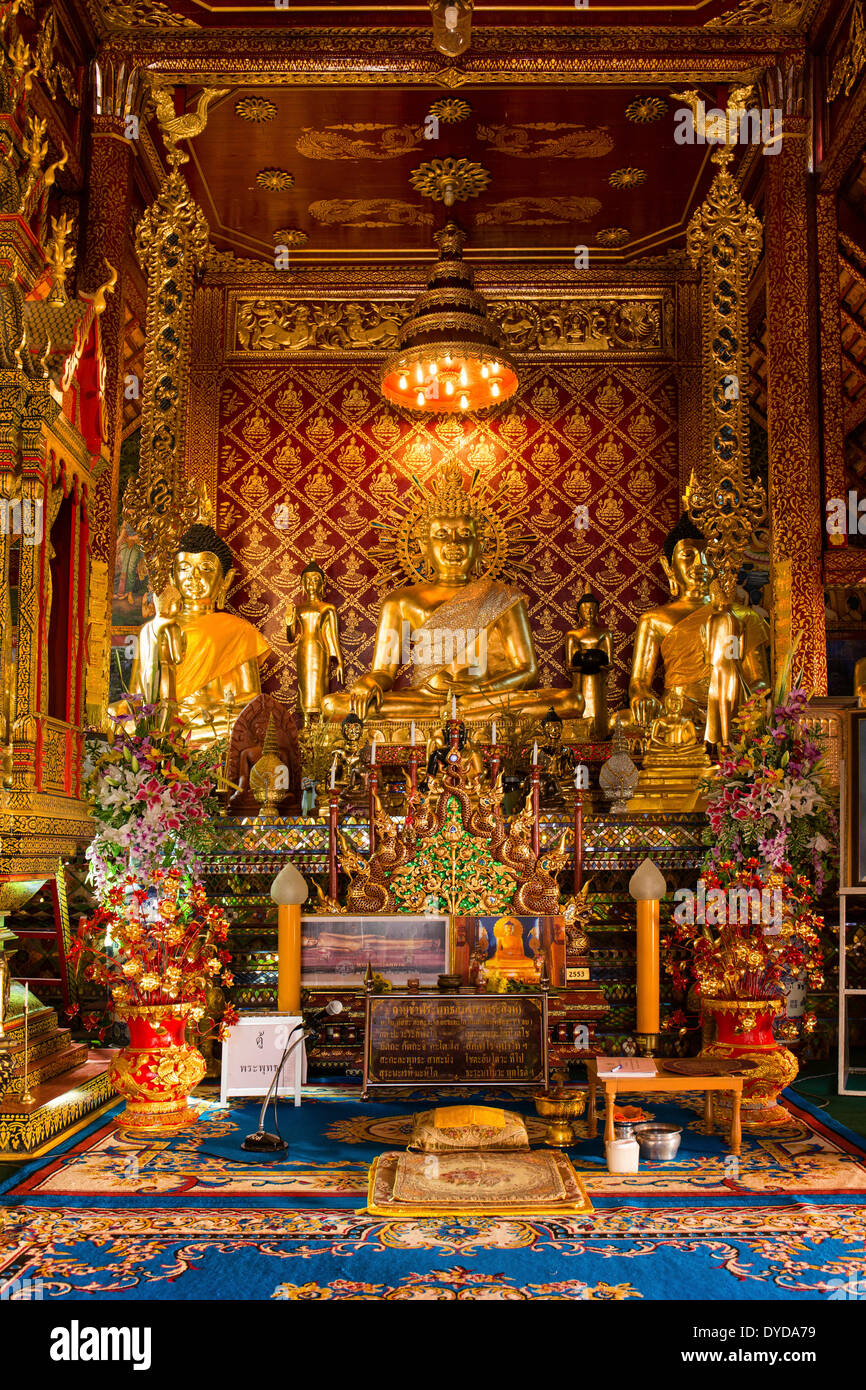 Golden Buddha statues in Wat Phrah Singh Temple, Chiang Rai, Chiang Rai province, Northern Thailand, Thailand Stock Photo
