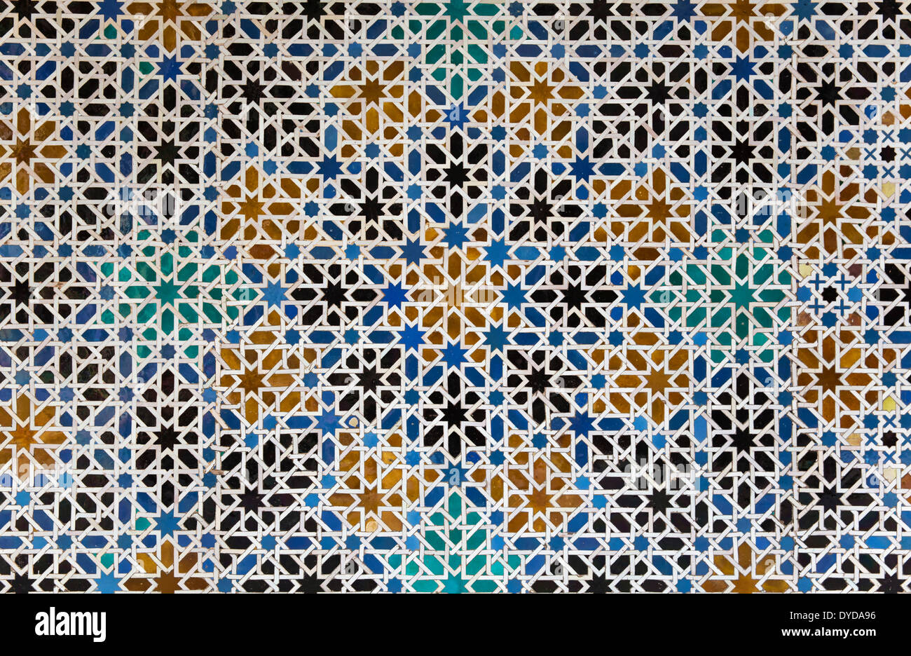Mudéjar tiles with Moorish geometric patterns in the Alcázar of Seville, Seville province, Andalusia, Spain Stock Photo