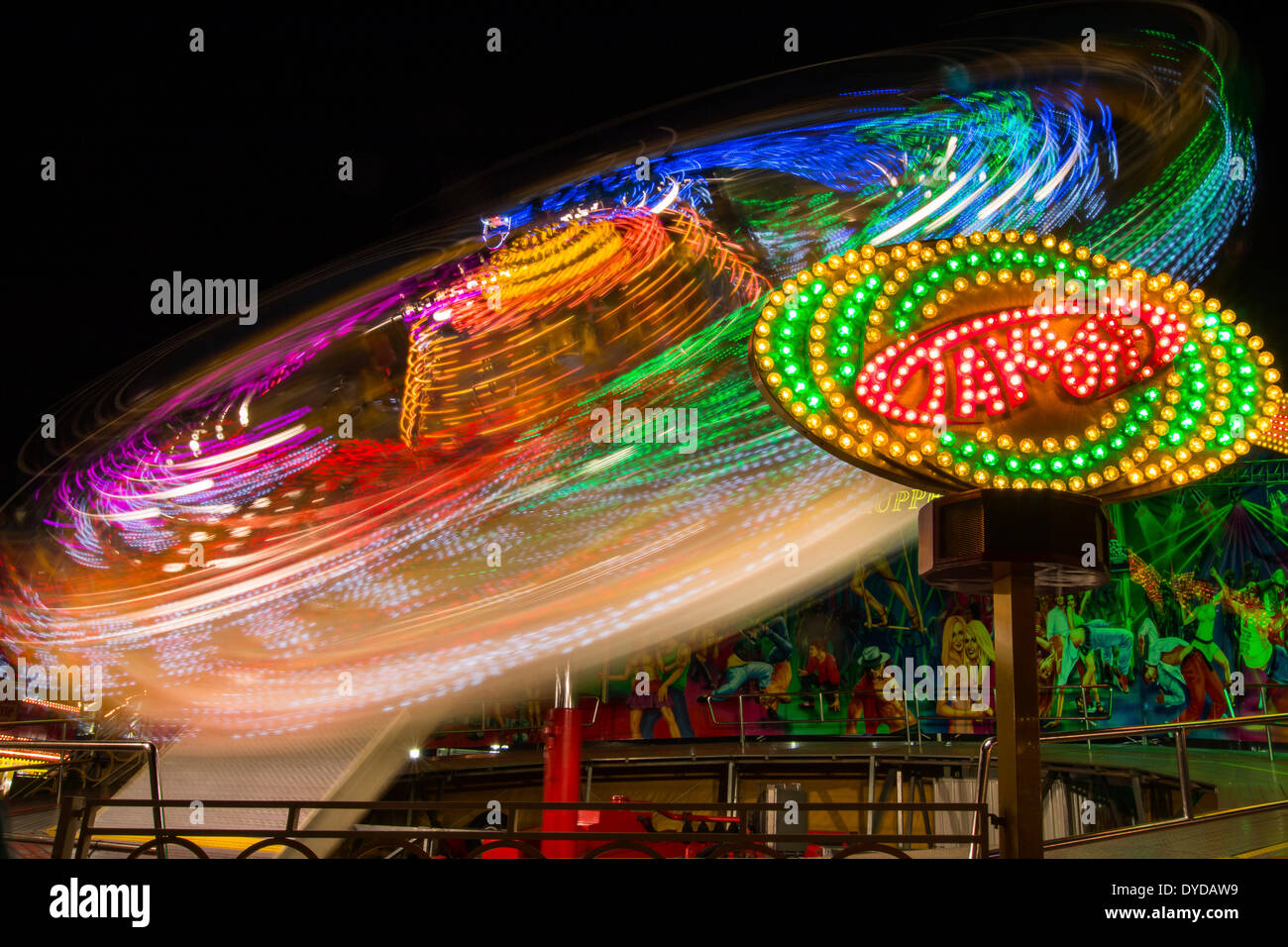 Amusement ride, light trails at night, Kassel, Hesse, Germany Stock Photo