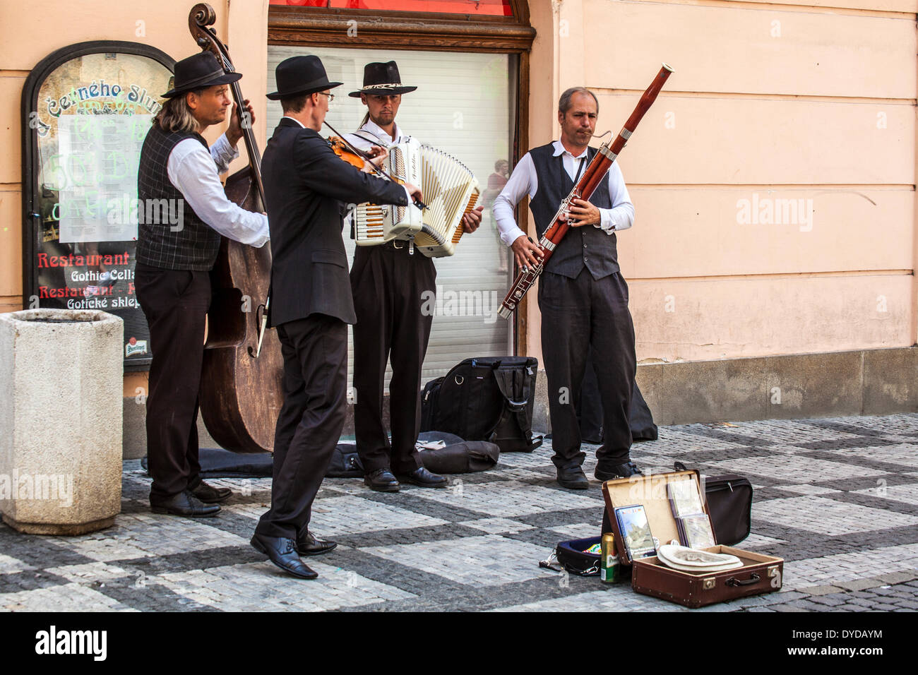 Street musicians play in a street off the Old Town Square in Prague. Stock Photo