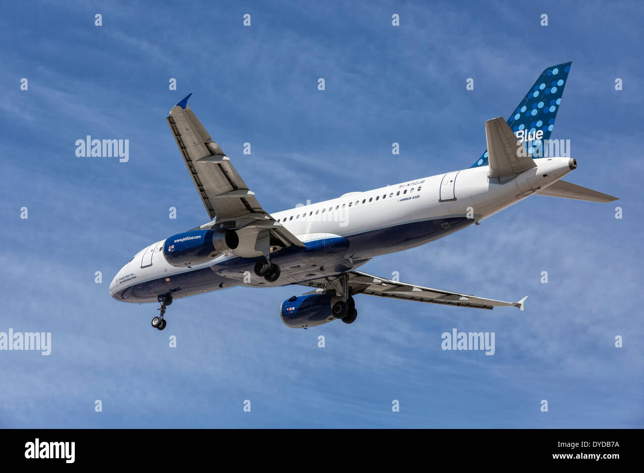 An Airbus A320 of JetBlue on final approach Stock Photo