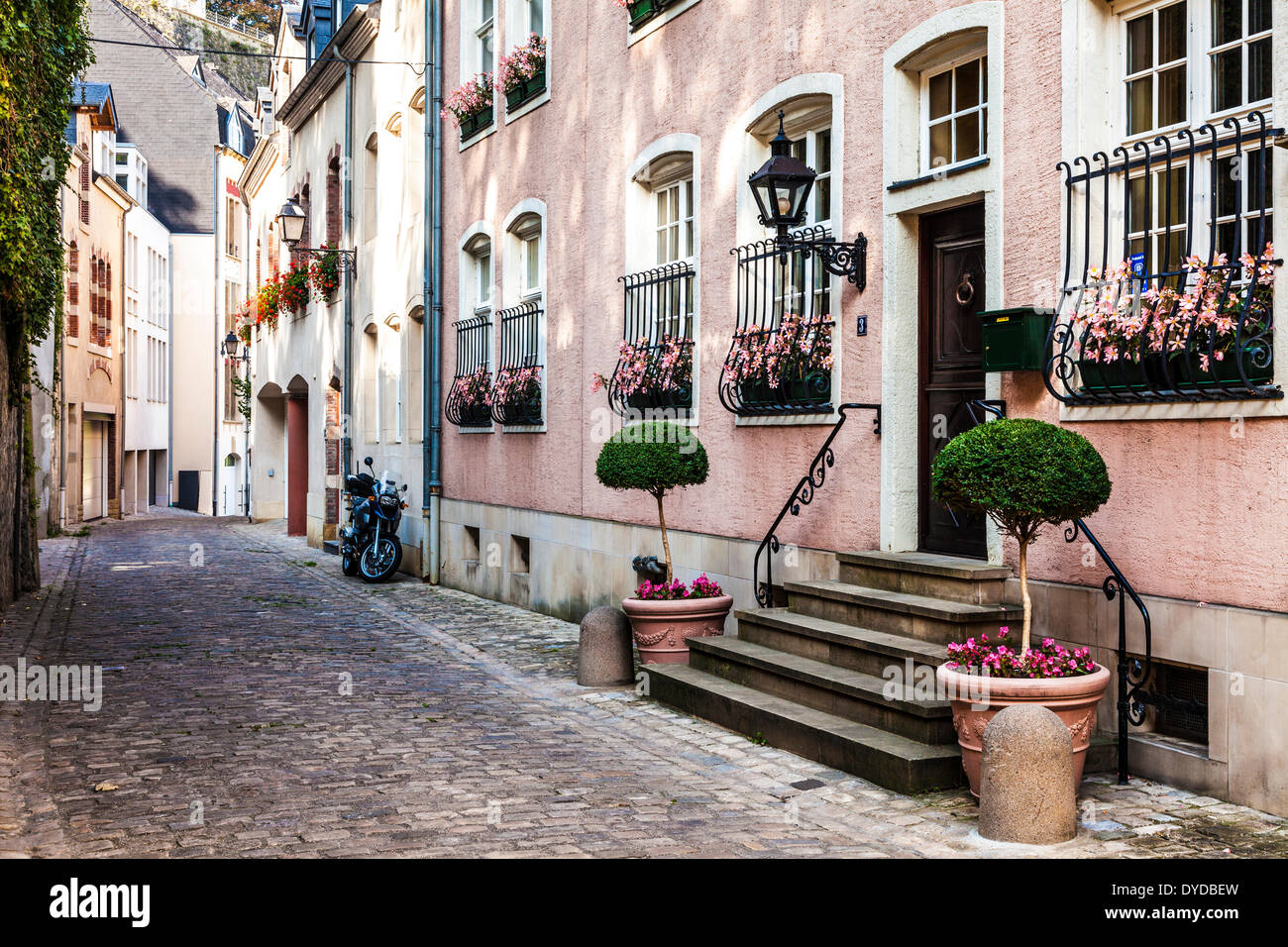 A pretty cobbled street in the Grund district of Luxembourg City. Stock Photo