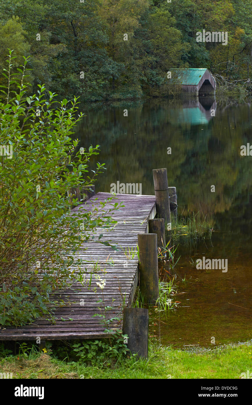 The jetty and boathouse at Milton Basin on Loch Ard. Stock Photo