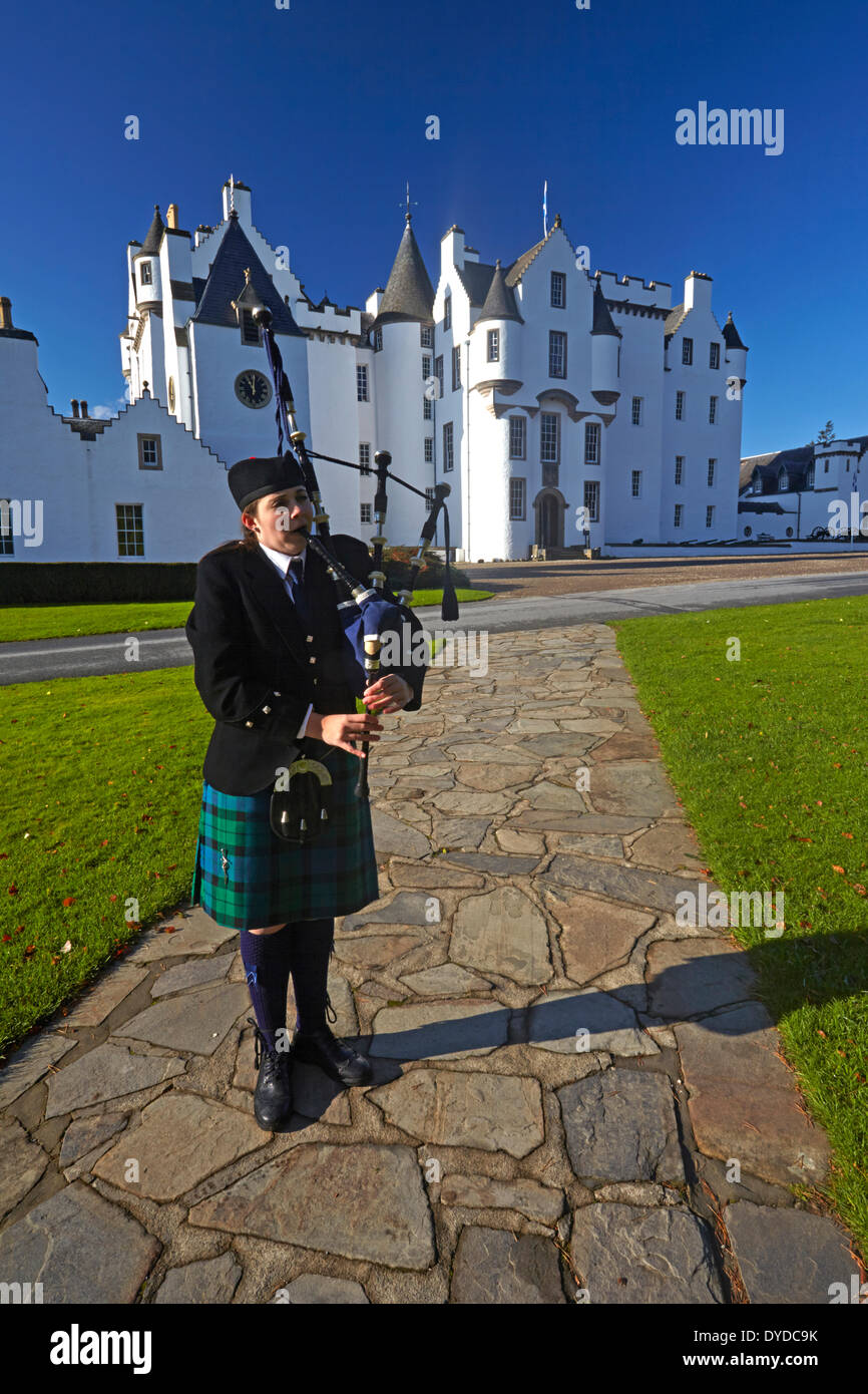 A Scottish piper outside Blair Castle. Stock Photo