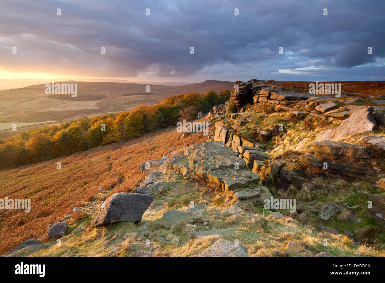 A dramatic autumnal sunset over Stanage Edge in the Peak District National Park. Stock Photo