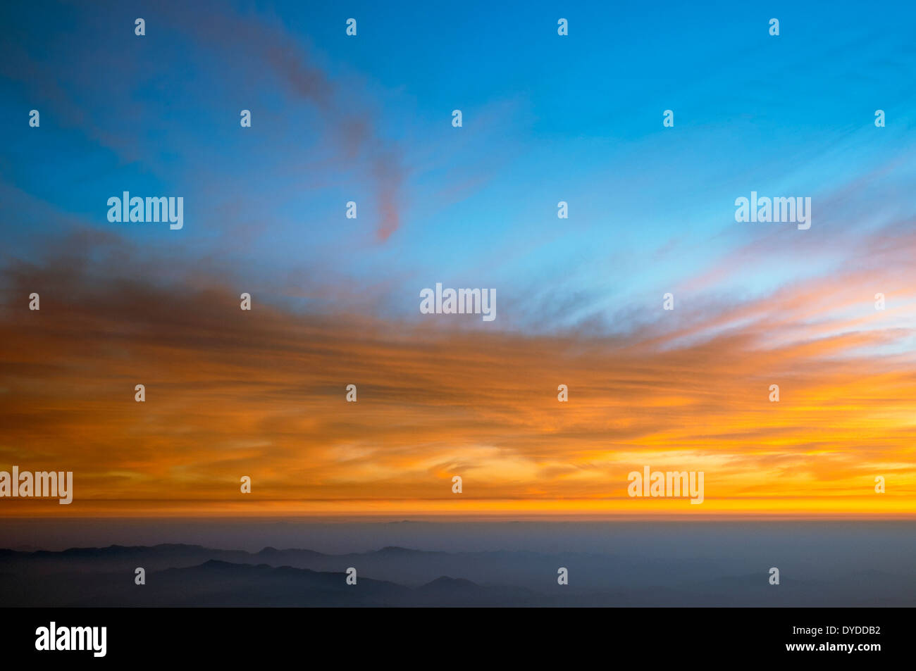 scenic morning sky over dark mountain ridges Stock Photo - Alamy