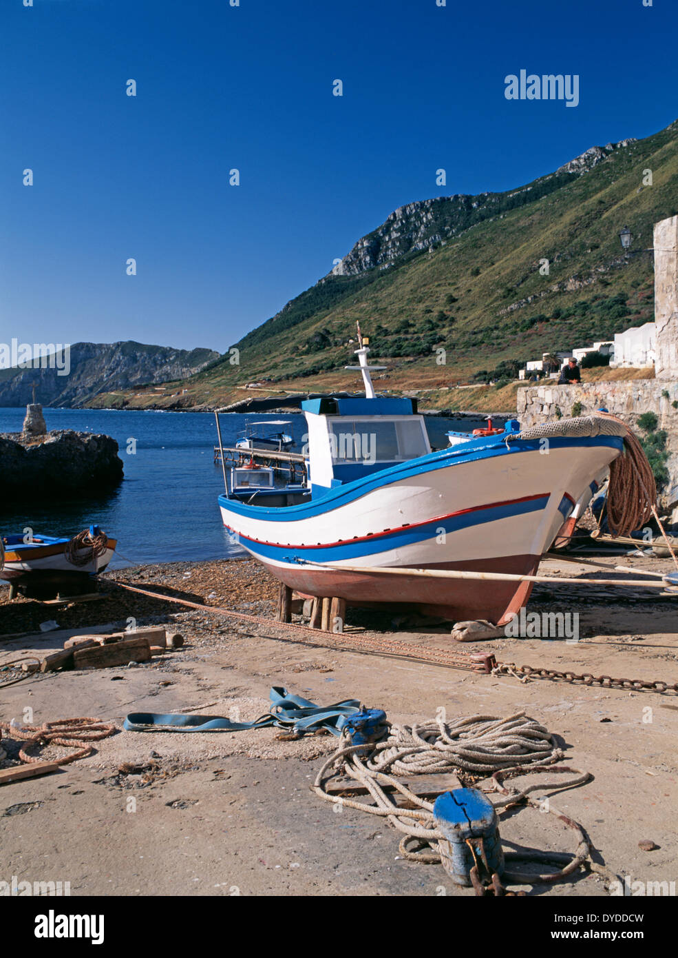 Fishing boat in dry dock at Marettimo on the Egadi Islands. Stock Photo