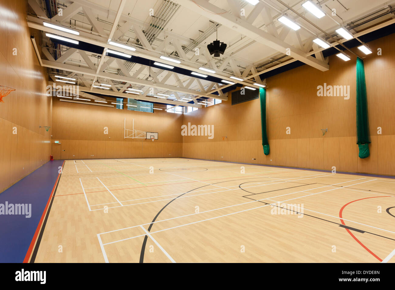 Unoccupied interior of the sports hall at Notting Hill and Ealing High School. Stock Photo