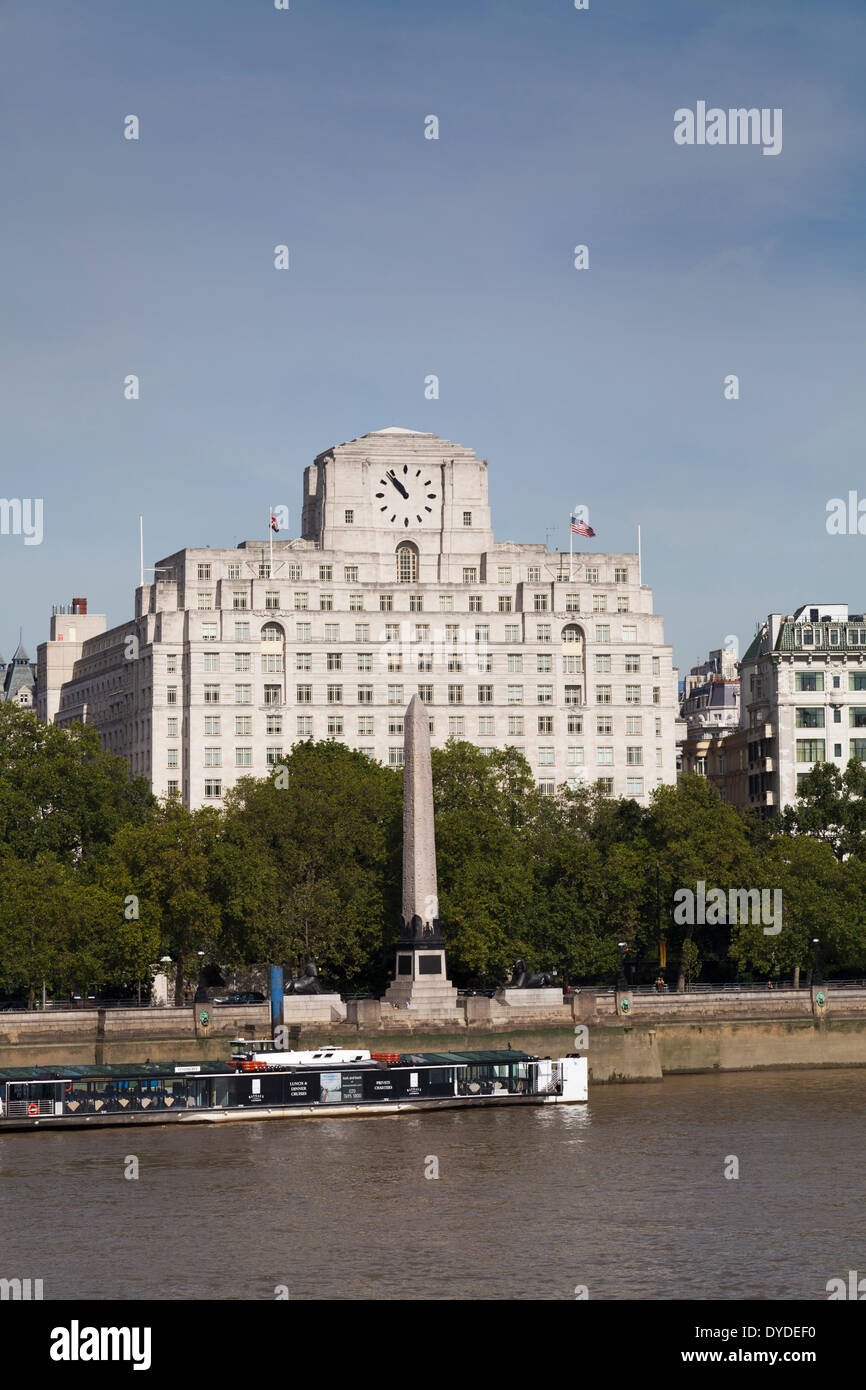 Shell Mex House and Cleopatra's Needle by the Thames in London. Stock Photo