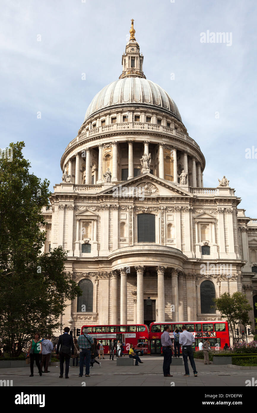 St Paul's Cathedral and dome with red London buses. Stock Photo