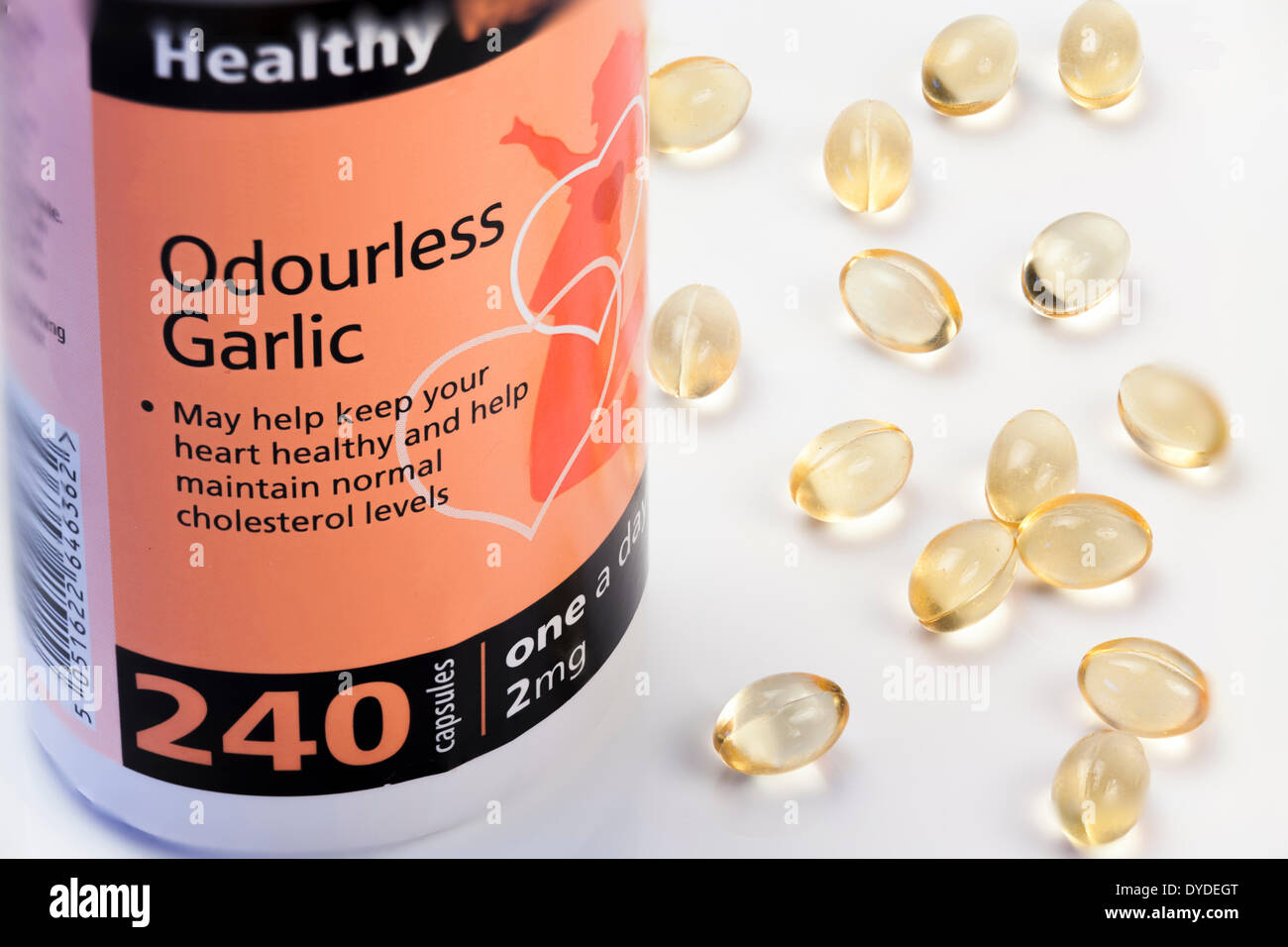 Close up studio still life of Odourless Garlic Capsules and container. Stock Photo