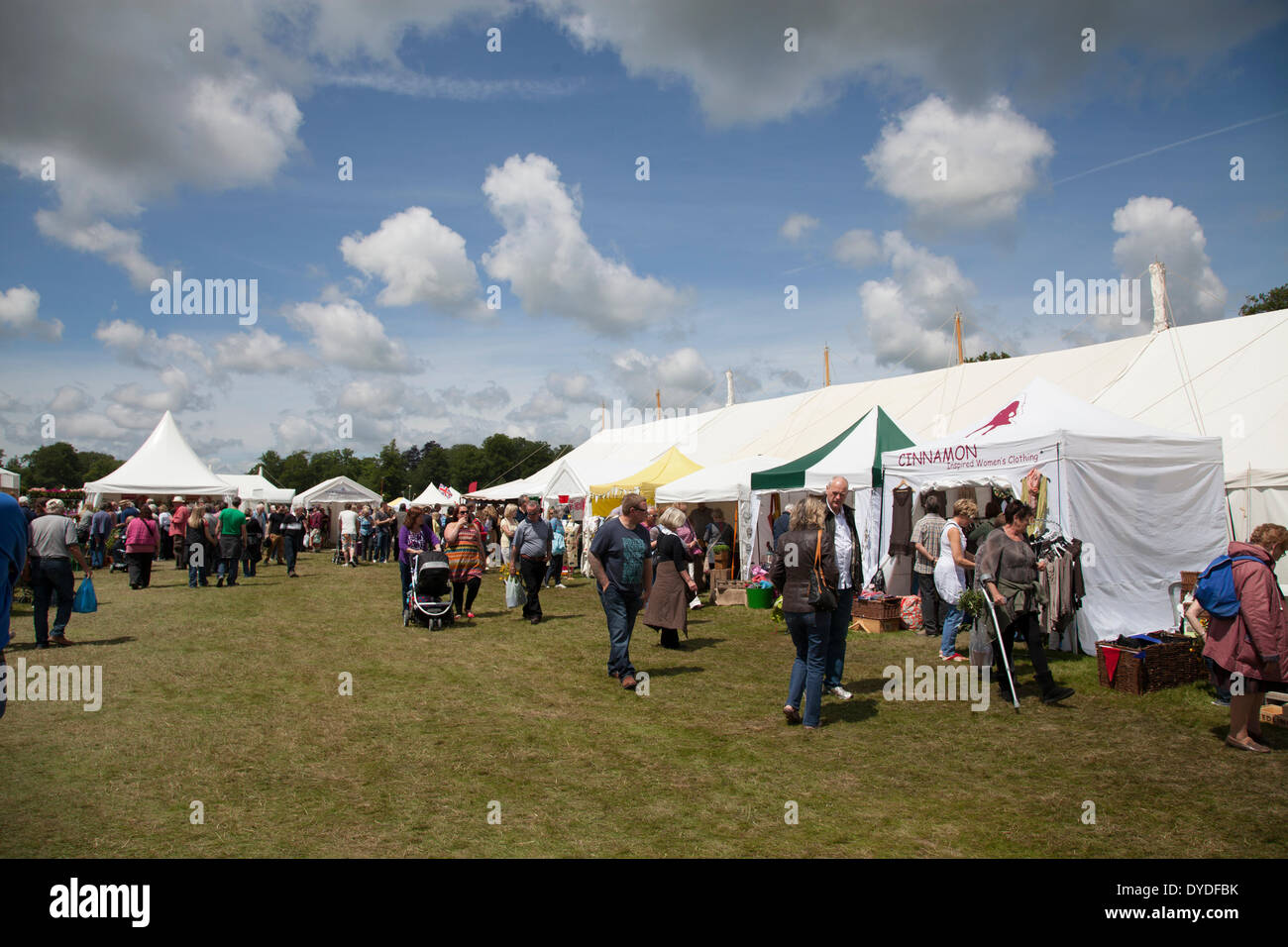 Visitors at country show outside marquees. Stock Photo