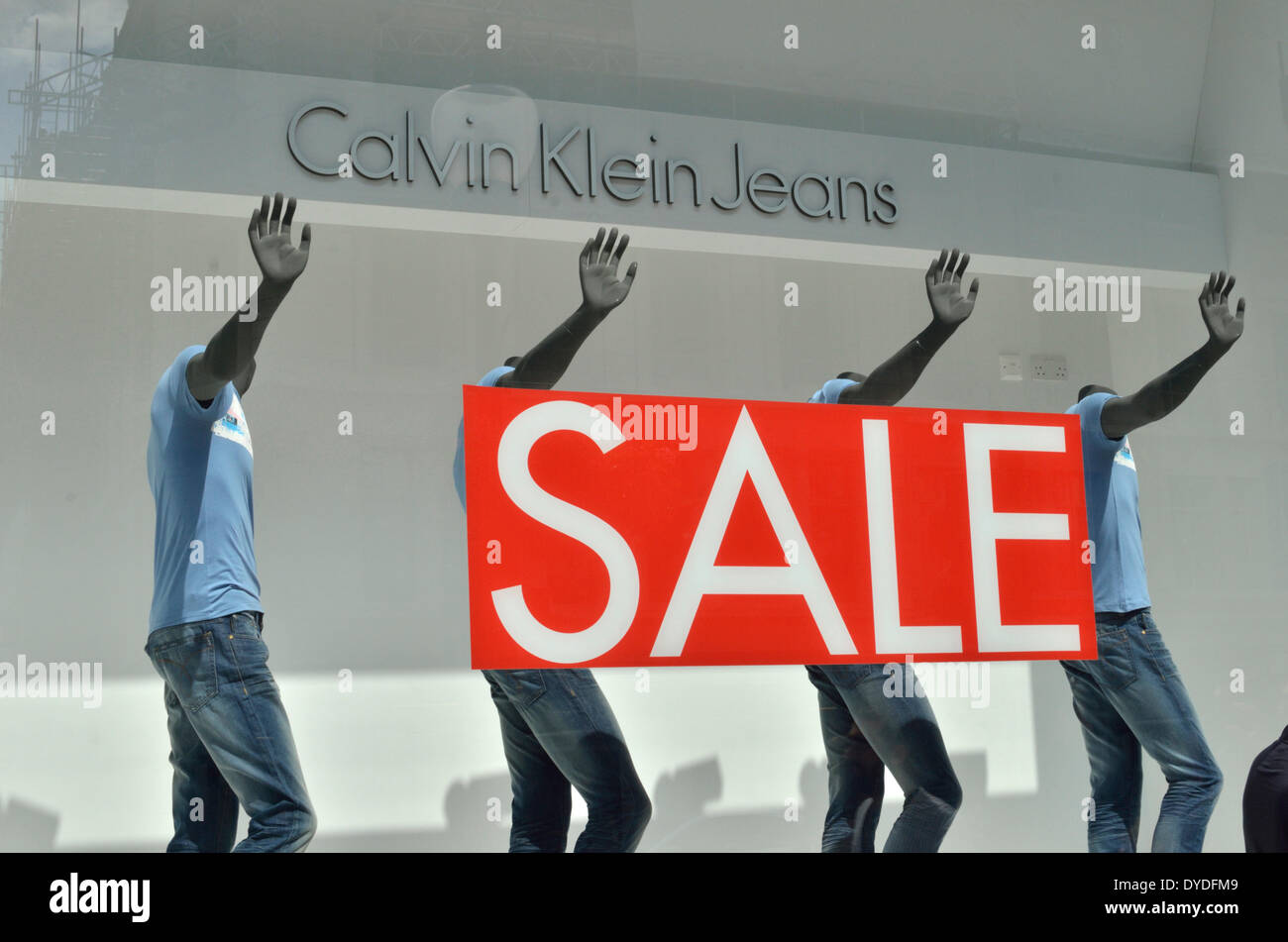 Calvin Klein Jeans sale sign in a shop window Stock Photo - Alamy