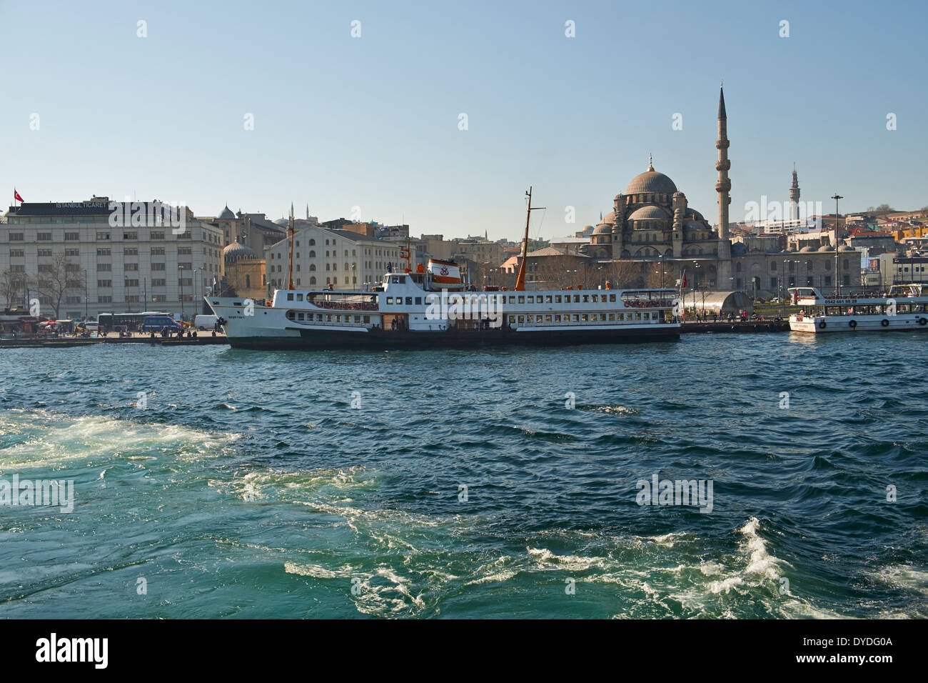 Looking back towards the New Mosque from a boat on the Bosphorus, Istanbulin Turkey. Stock Photo