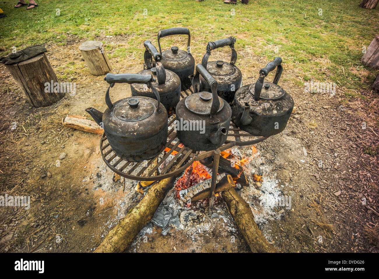 Kettles on the fire at Rise up Singing camp on Dartmoor Stock Photo Alamy