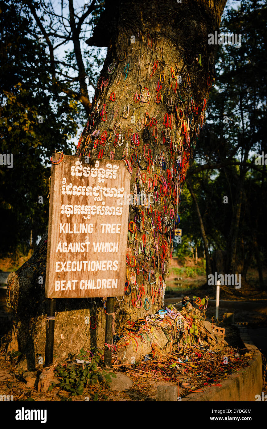 The Killing Tree against which executioners beat children in The Killing Fields at Choeung Ek in Phnom Penh. Stock Photo