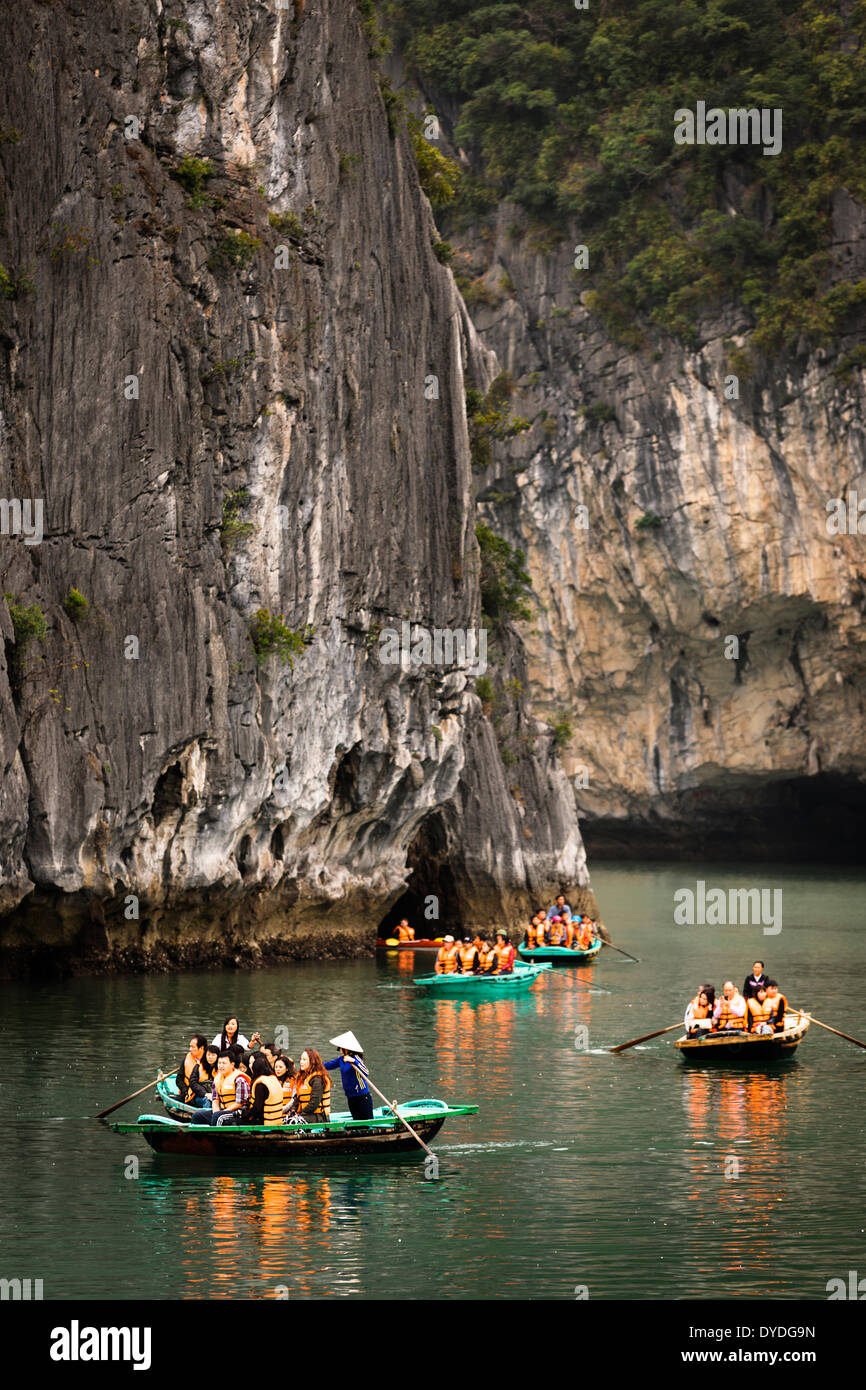 Tourists sightseeing in Ha Long Bay. Stock Photo