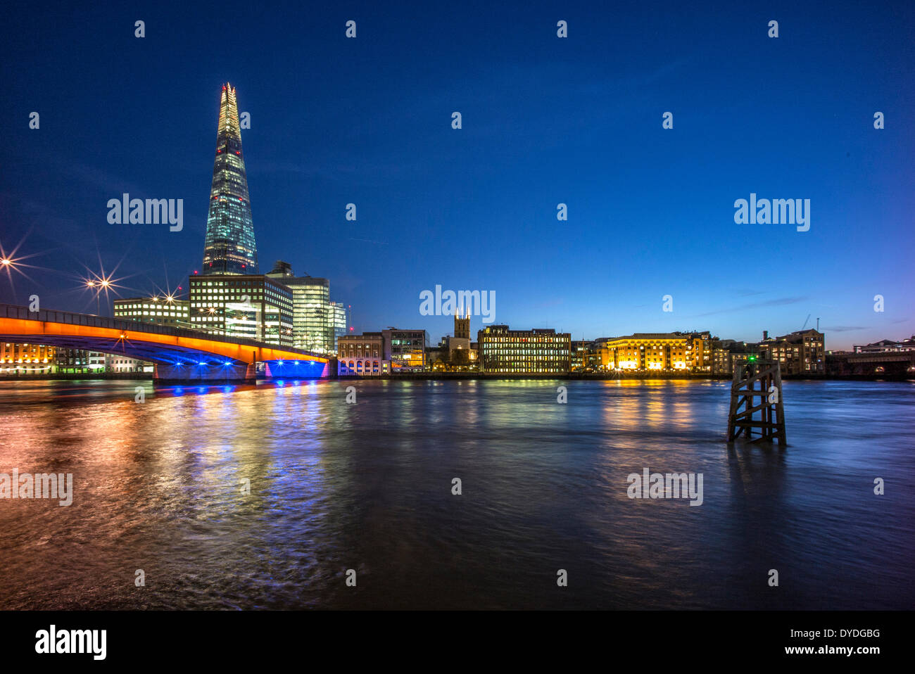 The Shard with Southwark Cathedral and London Bridge. Stock Photo