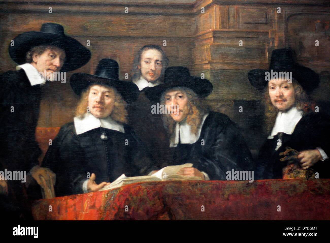 The Wardens of the Amsterdam Drapers' Guild, known as 'The Syndics' by Rembrandt Harmenszoon van Rijn (1606-1669). Oil on canvas, 1662. The syndics inspected the quality of dyed cloth. This work not only attests to Rembrandt's endless creativity, but also to his undiminished popularity among the citizens of Amsterdam. Stock Photo