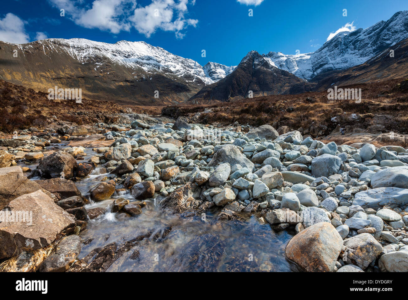 The Cuillin Hills from beside the Allt Coir a Mhadhaidh on the Fairy Pools walk into Glen Brittle on the Isle of Skye. Stock Photo