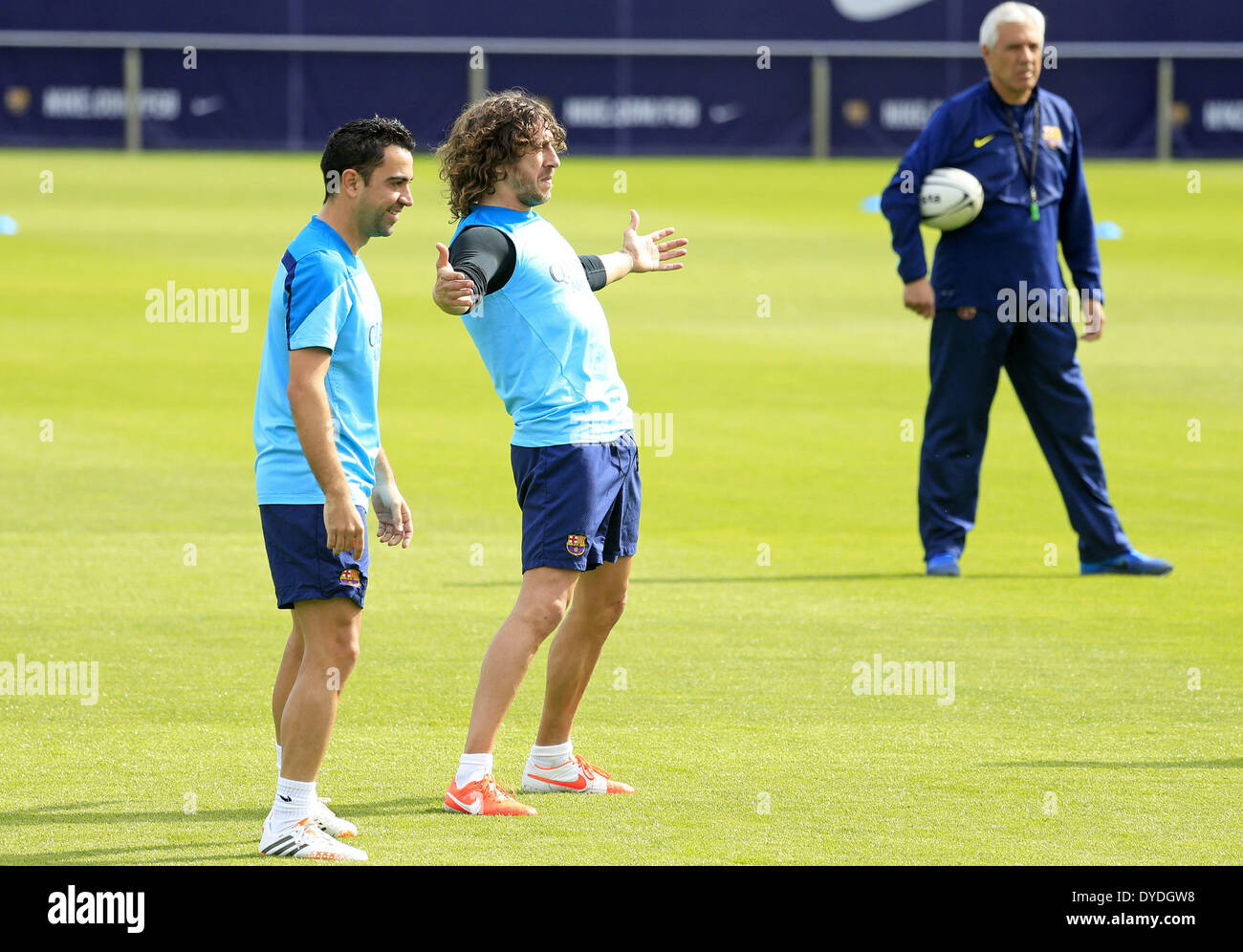 Barcelona, Spain. 15th Apr, 2014. BARCELONA-SPAIN April -15. Carles Puyol and Xavi Hernandez in the FC Barcelona training and press conference preceding the final of the Copa del Rey, which took place at the Ciudad Deportiva Joan Gamper of FC Barcelona, ''on April 5, 2014 Photo: Joan Valls/Urbanandsport /Nurphoto © Joan Valls/NurPhoto/ZUMAPRESS.com/Alamy Live News Stock Photo
