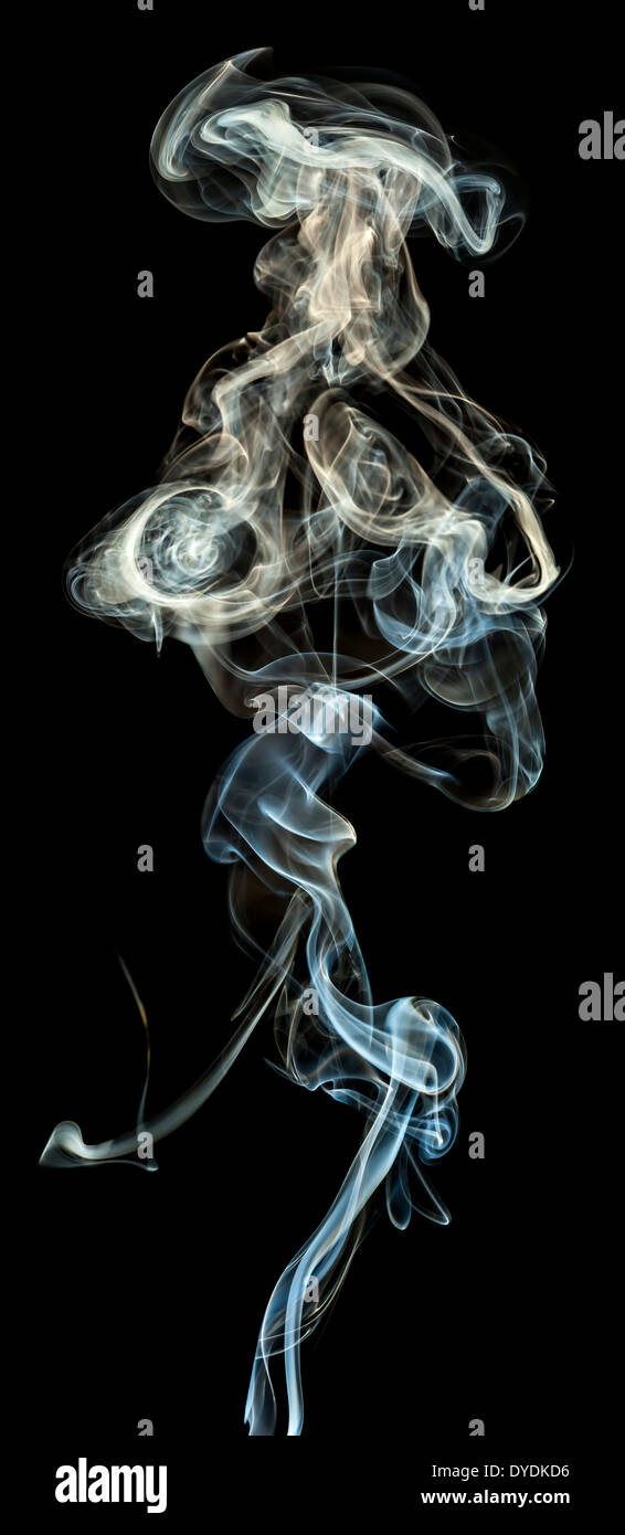 colored smoke isolated on a black background Stock Photo - Alamy