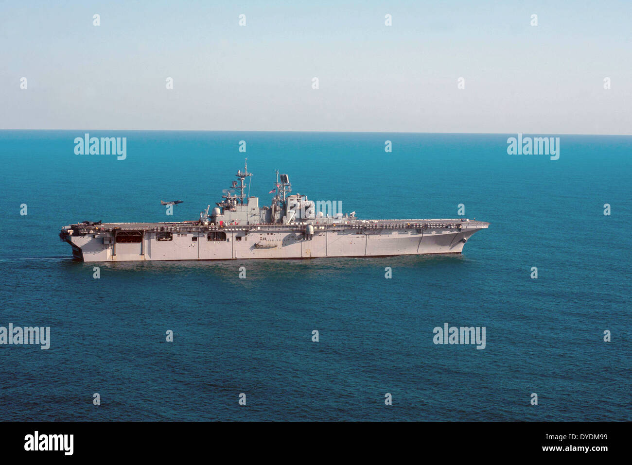 US Navy amphibious assault ship USS Iwo Jima during flight operations March 8, 2014 in the Atlantic Ocean. Stock Photo