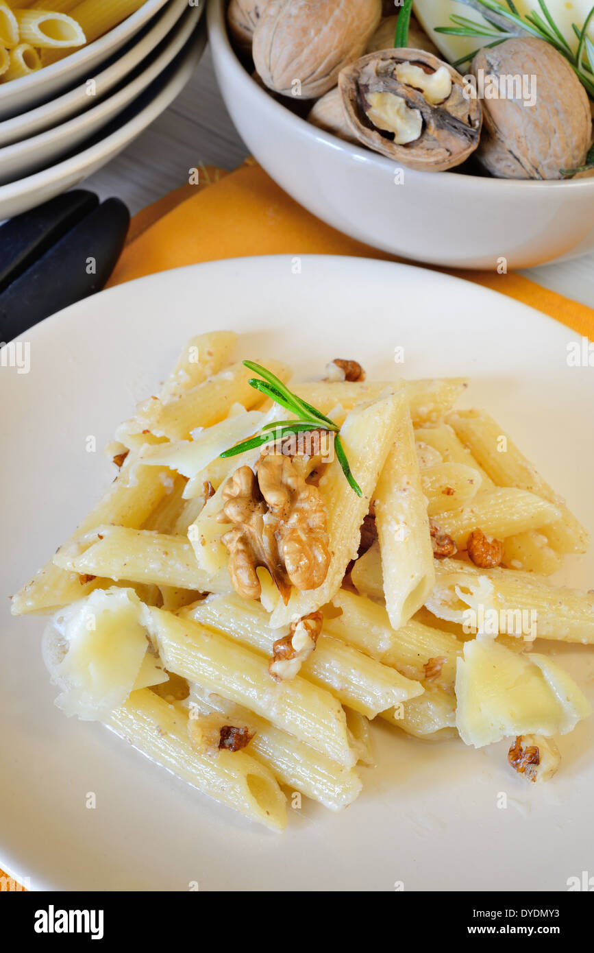 Italian rigatoni pasta with nuts cream and pecorino cheese Stock Photo