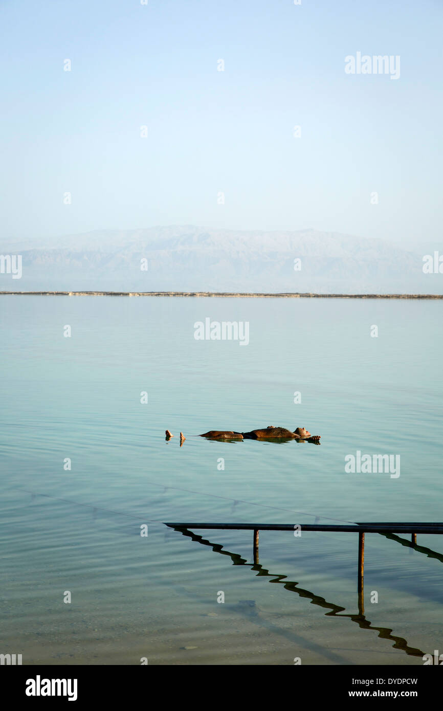 People floating at the Dead Sea, Israel. Stock Photo