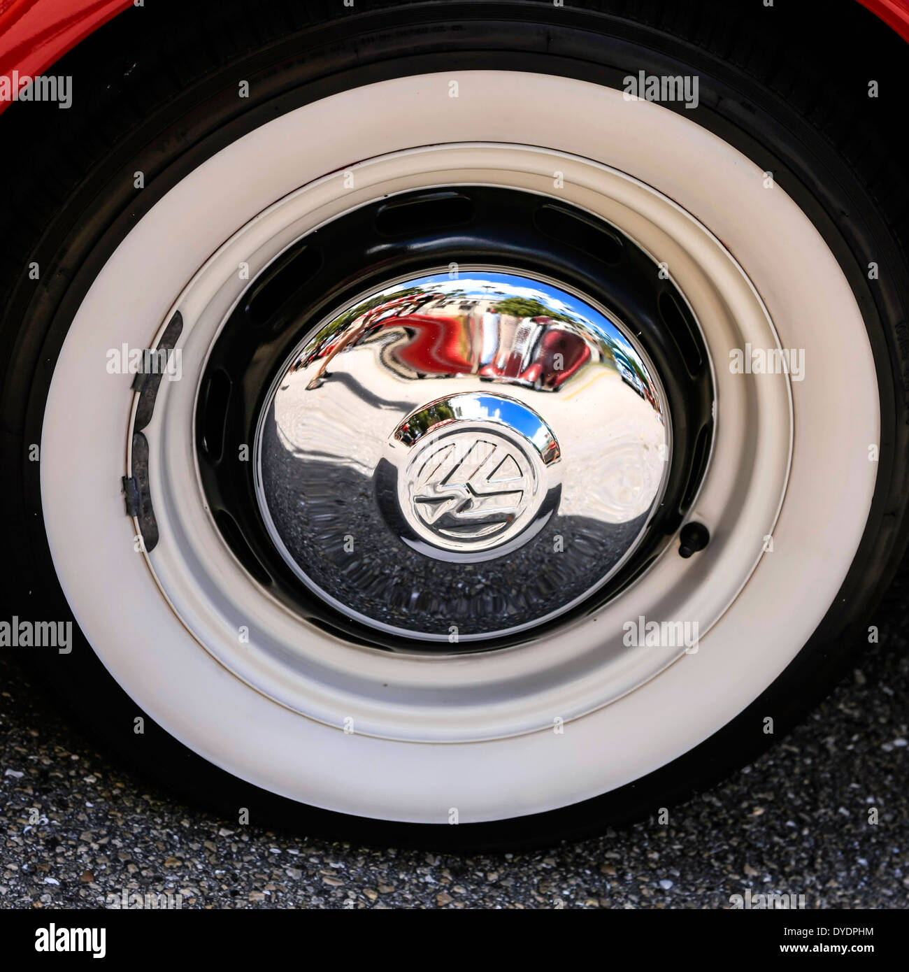1959 Volkswagen Super Beetle 1300 white wall tire and hub cap Stock Photo