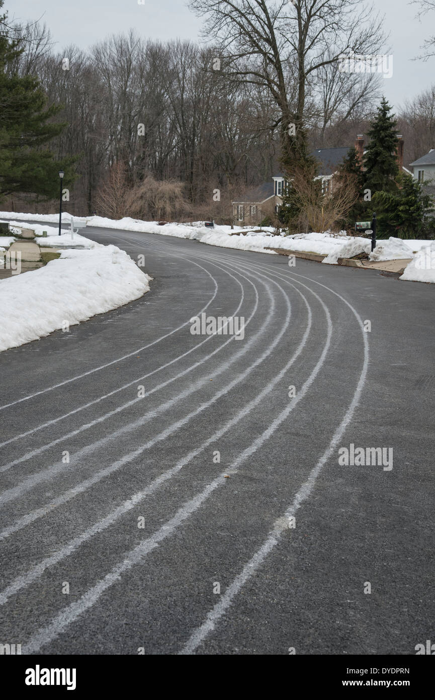 Salt Brine On Road In Preparation For Approaching Winter Snow Storm Stock Photo
