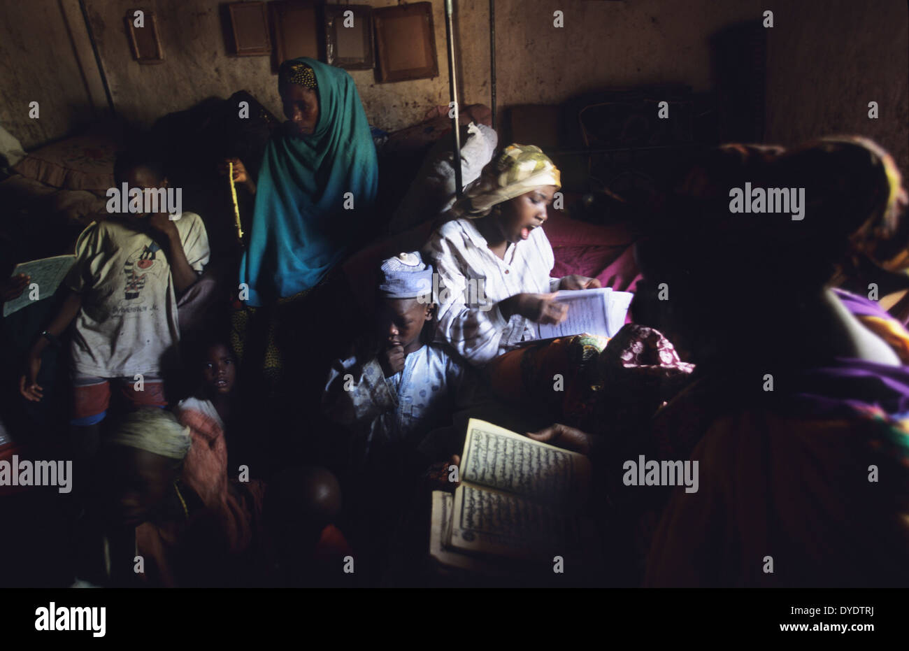 Womens Muslim prayer during Ramadan, segregated from men, indoors, in private. Kano, Kano State, Nigeria Stock Photo