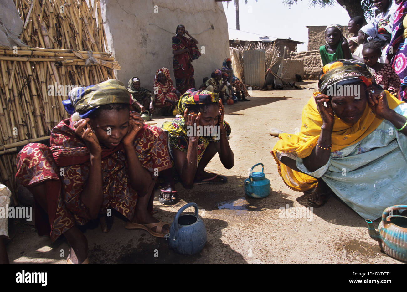 Womens Muslim prayer during Ramadan, segregated from men, indoors, in private. Kano, Kano State, Nigeria Stock Photo