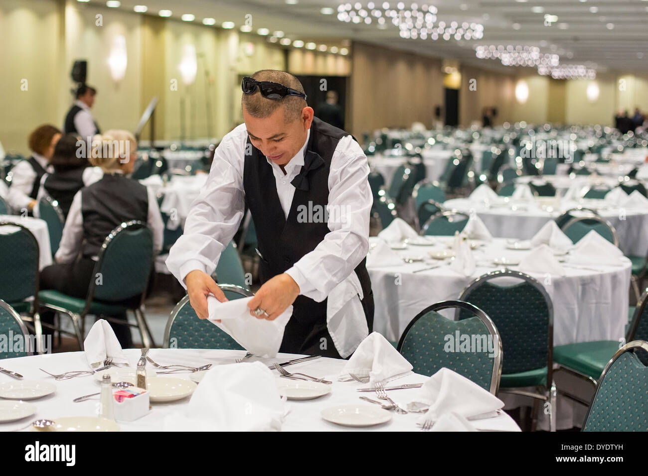 Rosemont, Illinois - A worker prepares for a banquet at the Crown Plaza Chicago O'Hare hotel. Stock Photo