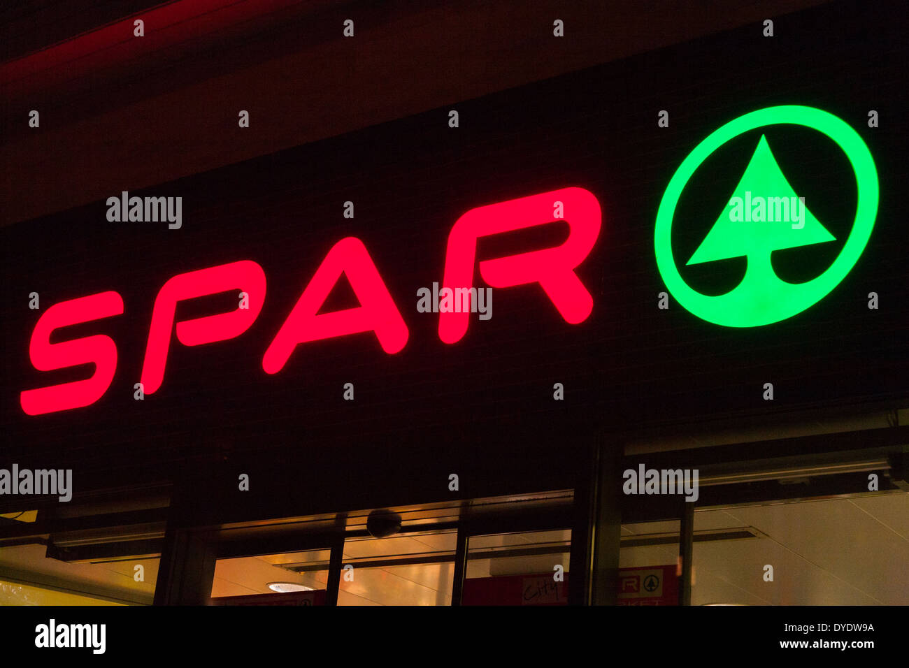 Logo / sign outside a Spar shop supermarket / shop / store at night