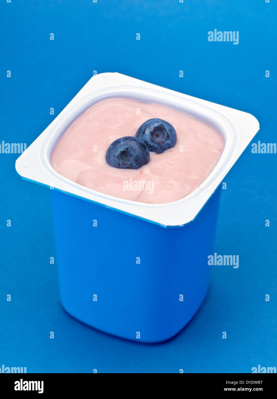 Yogurt with blueberry in blue plastic box Stock Photo