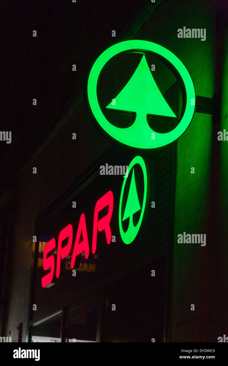Logo / sign outside a Spar shop supermarket / shop / store at night